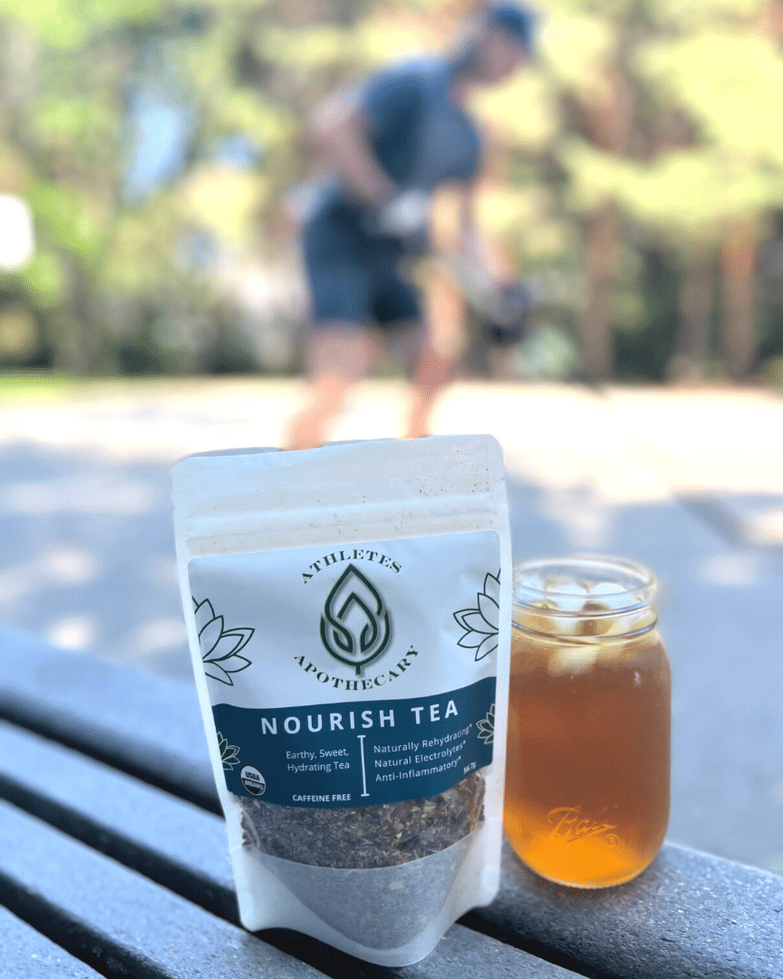 Hydrating tea with hockey player in background