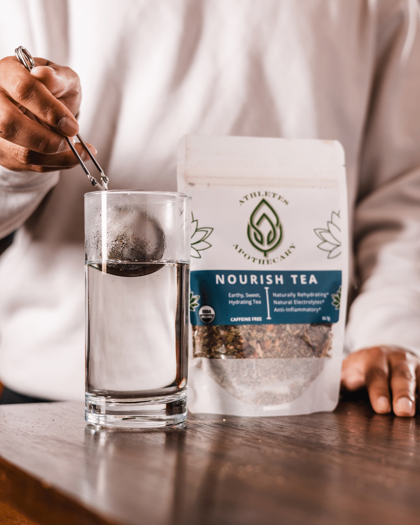 Athlete making a cup of Nourish Hydration Tea