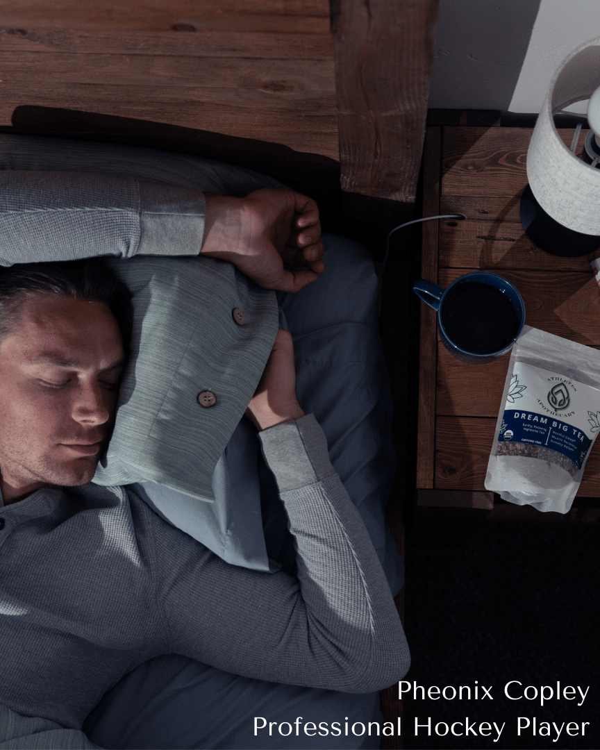 Pro athlete sleeping with tea on nightstand