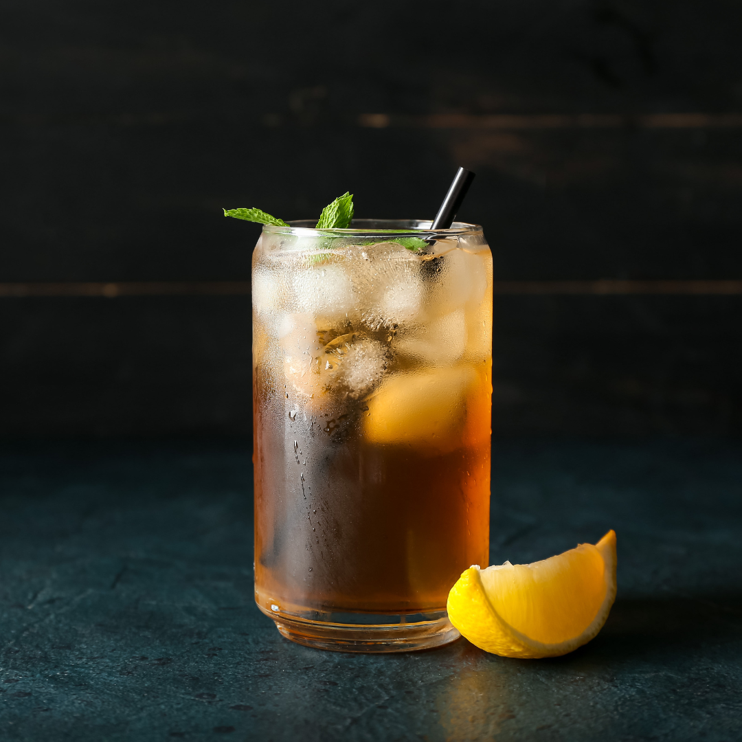 A fresh cup of iced tea with lemon and mint