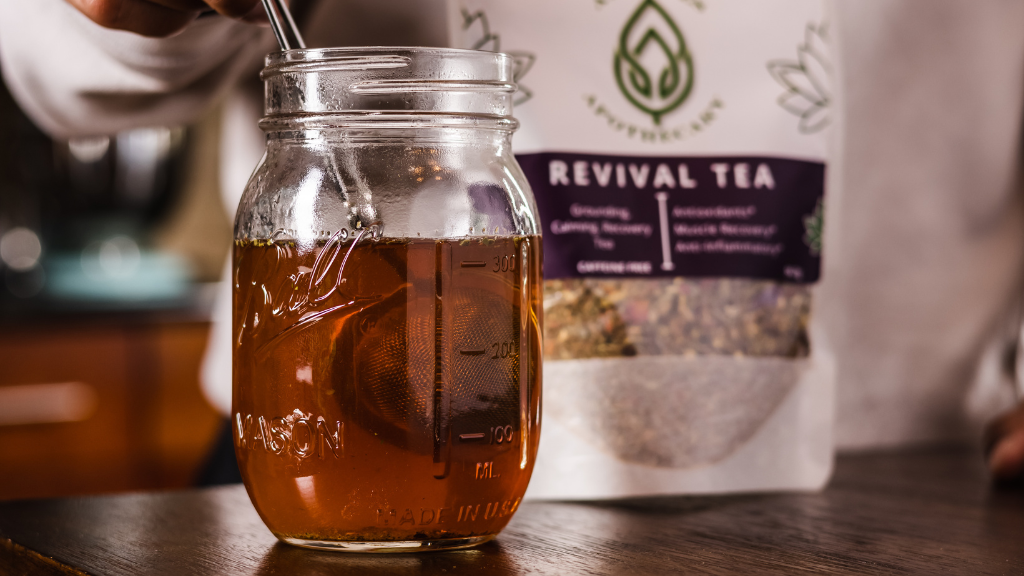 An athletic tea blend containing rooibos freshly prepared in a mason jar.