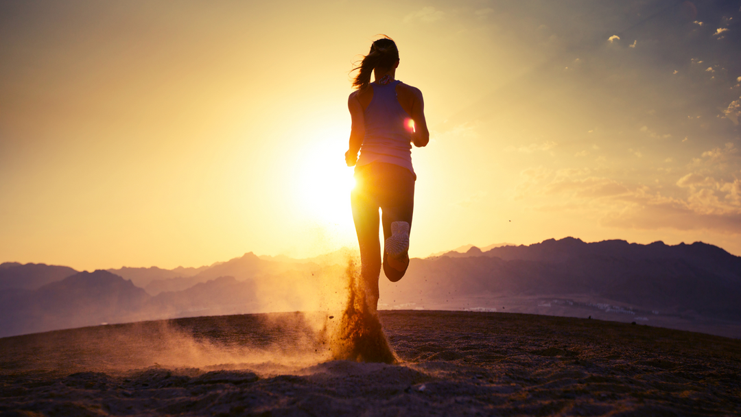 Runner outside at sunrise