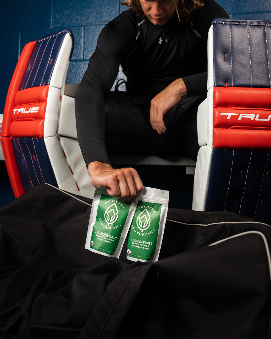 Pro hockey player Pheonix Copley removing superfood blends from bag