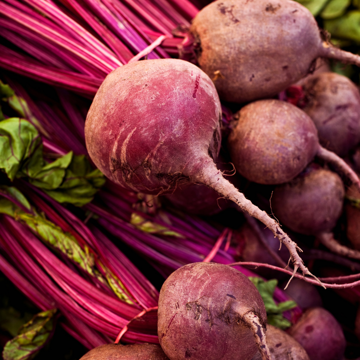 A close up of a pile of beets.