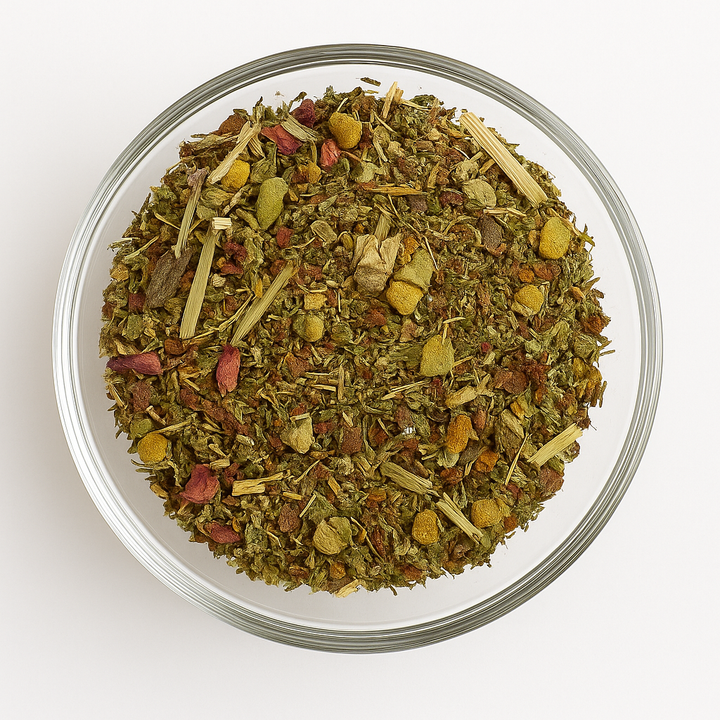 Herbal mix in a glass bowl on a white background