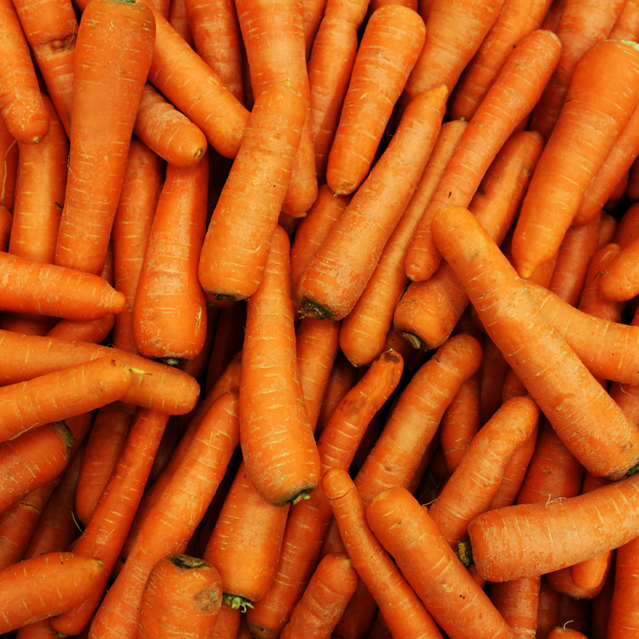 A close up of a pile of carrots